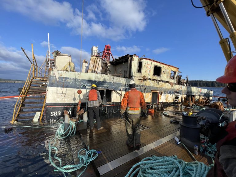 Finally afloat: Sunken barge in Port McNeill resurfaces