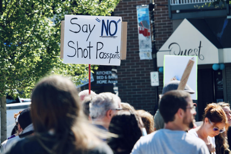 Anti-vaccine card rally draws large crowd