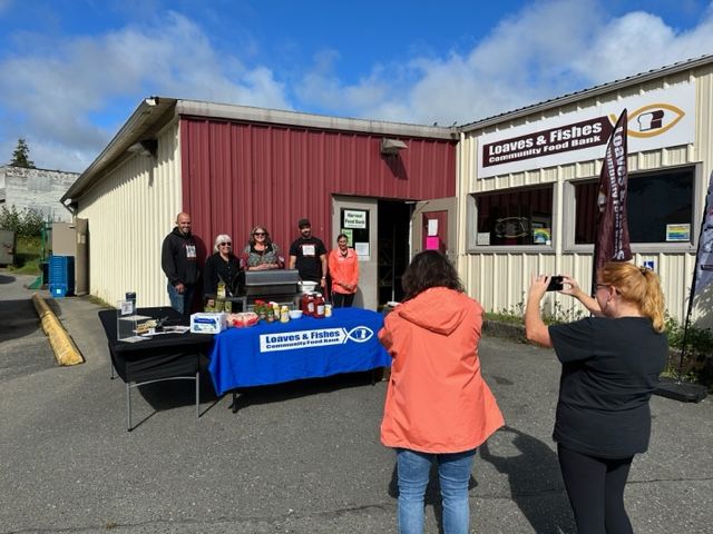 Food bank celebrates management changeover, expanded service