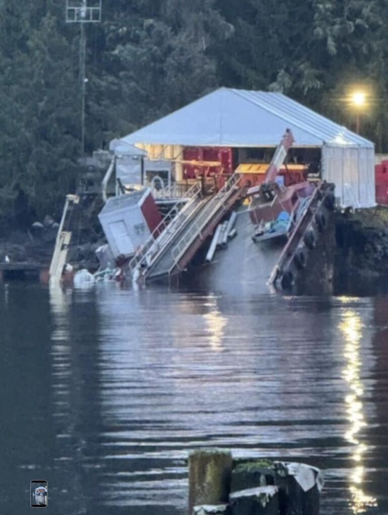 Salvage divers inspect sunken CANFISCO barge in Port Hardy